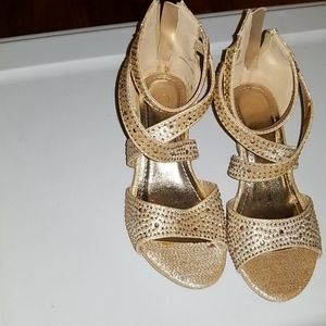 Gold and Fancy shoes for a little girl